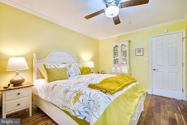a bathroom with a sink vanity mirror and toilet