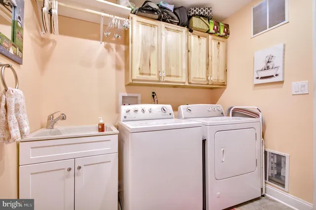 a view of a chairs and table in patio