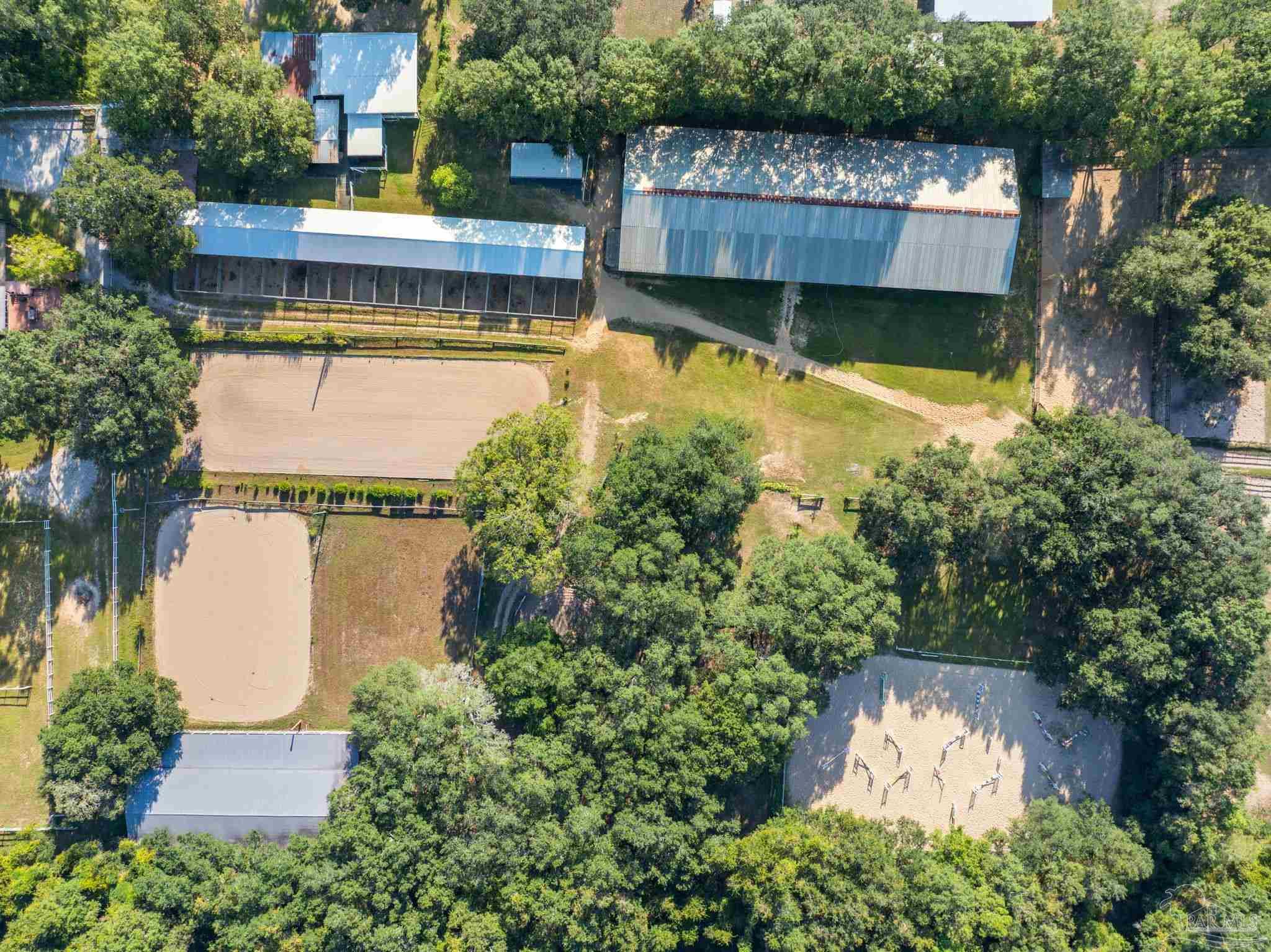 1911 Mathison Road Cantonment, FL 32533 - Photo 41 of 66 an aerial view of a house with swimming pool outdoor seating and yard