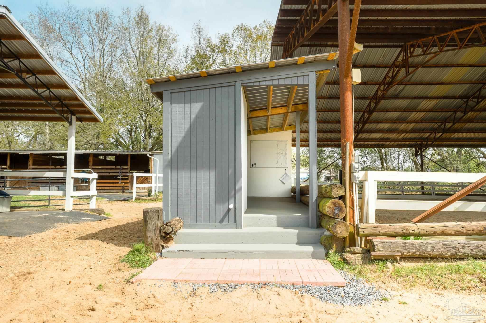 1911 Mathison Road Cantonment, FL 32533 - Photo 8 of 66 a view of a house with a outdoor space