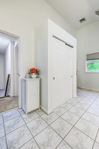 a view of a storage & utility room with a sink