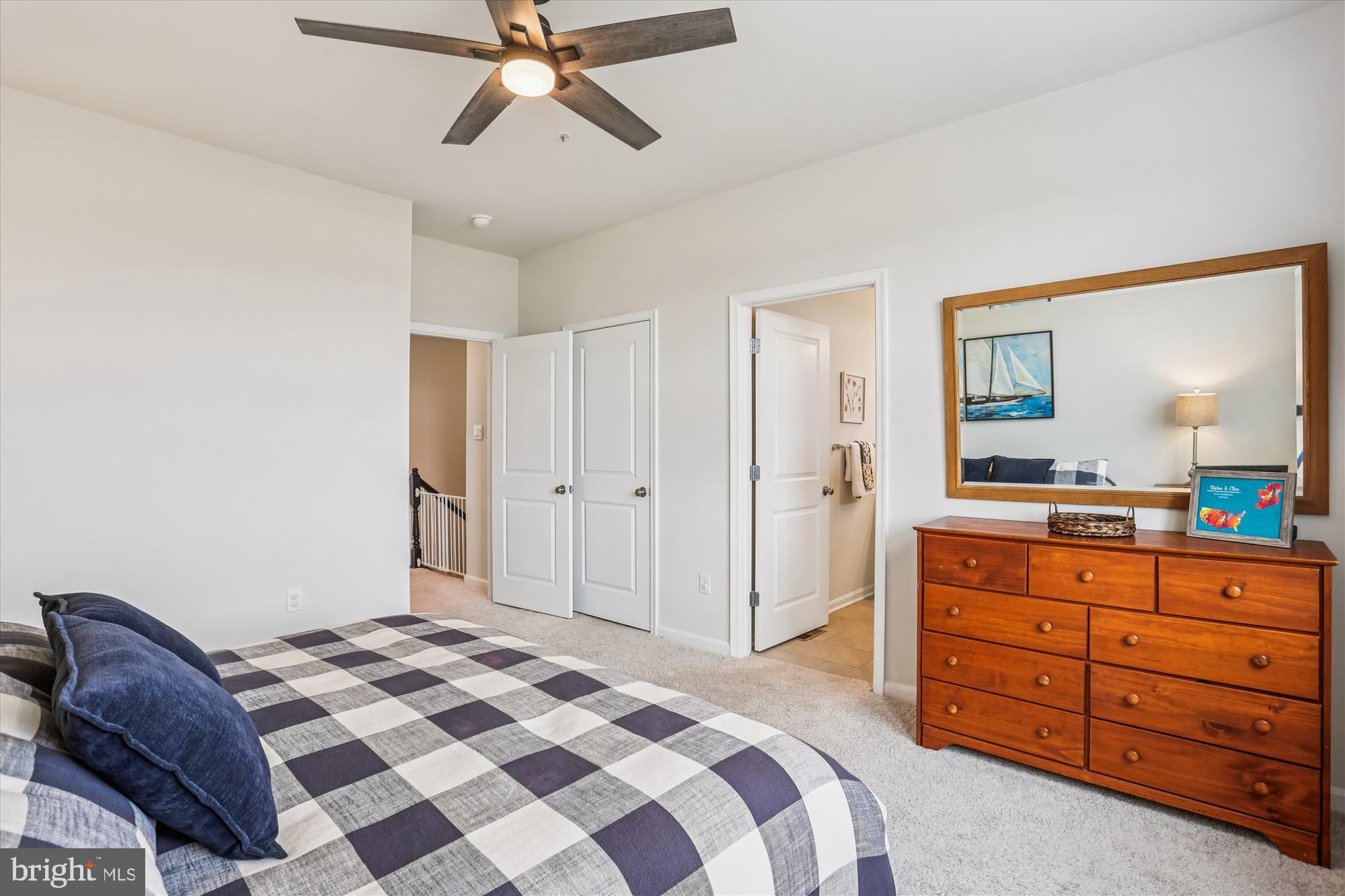 484 Tiller Street Frederick, MD 21701 - Photo 20 of 44 a bedroom with a bed and a dresser