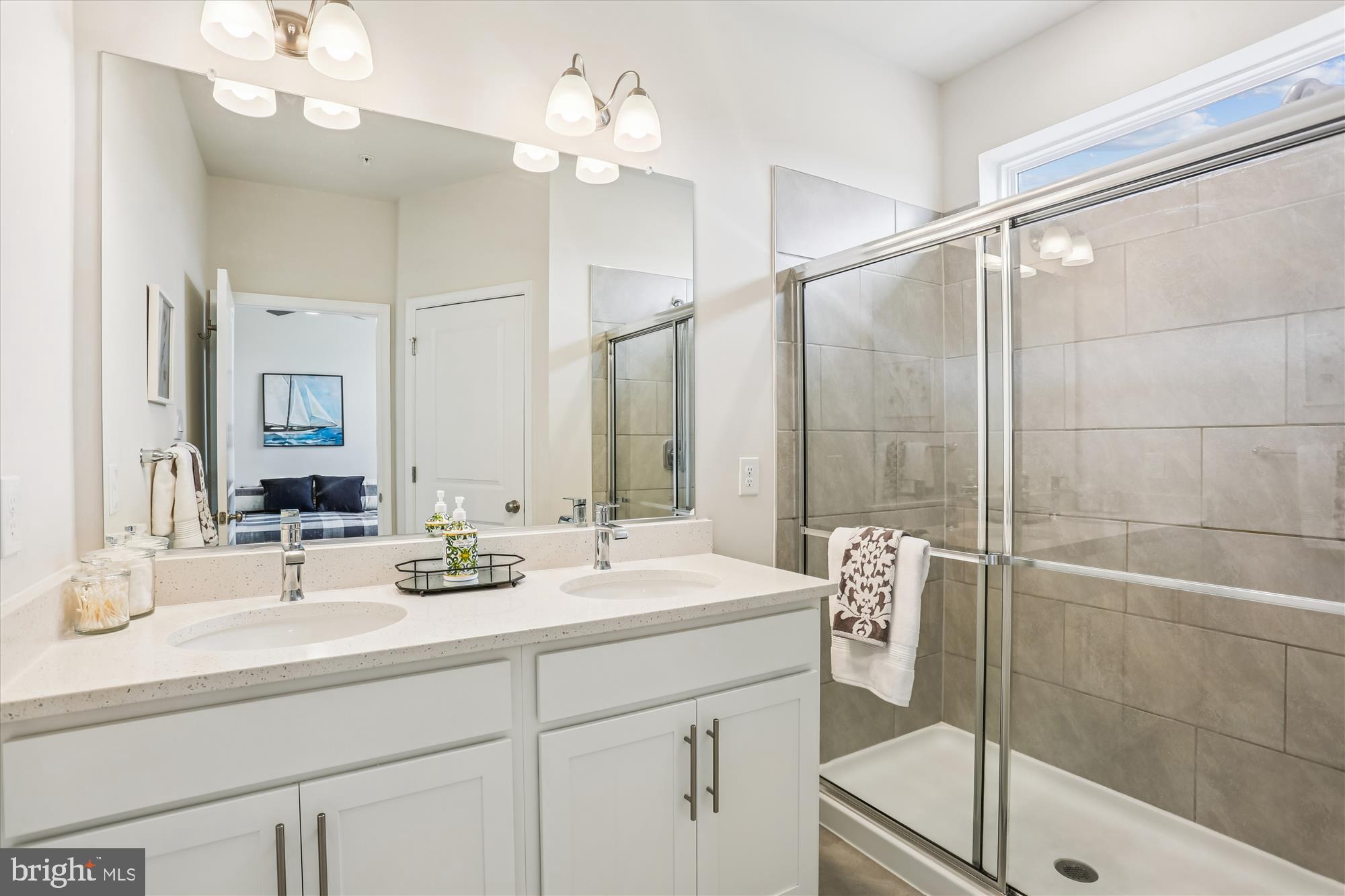 484 Tiller Street Frederick, MD 21701 - Photo 21 of 44 a bathroom with a double vanity sink mirror and double