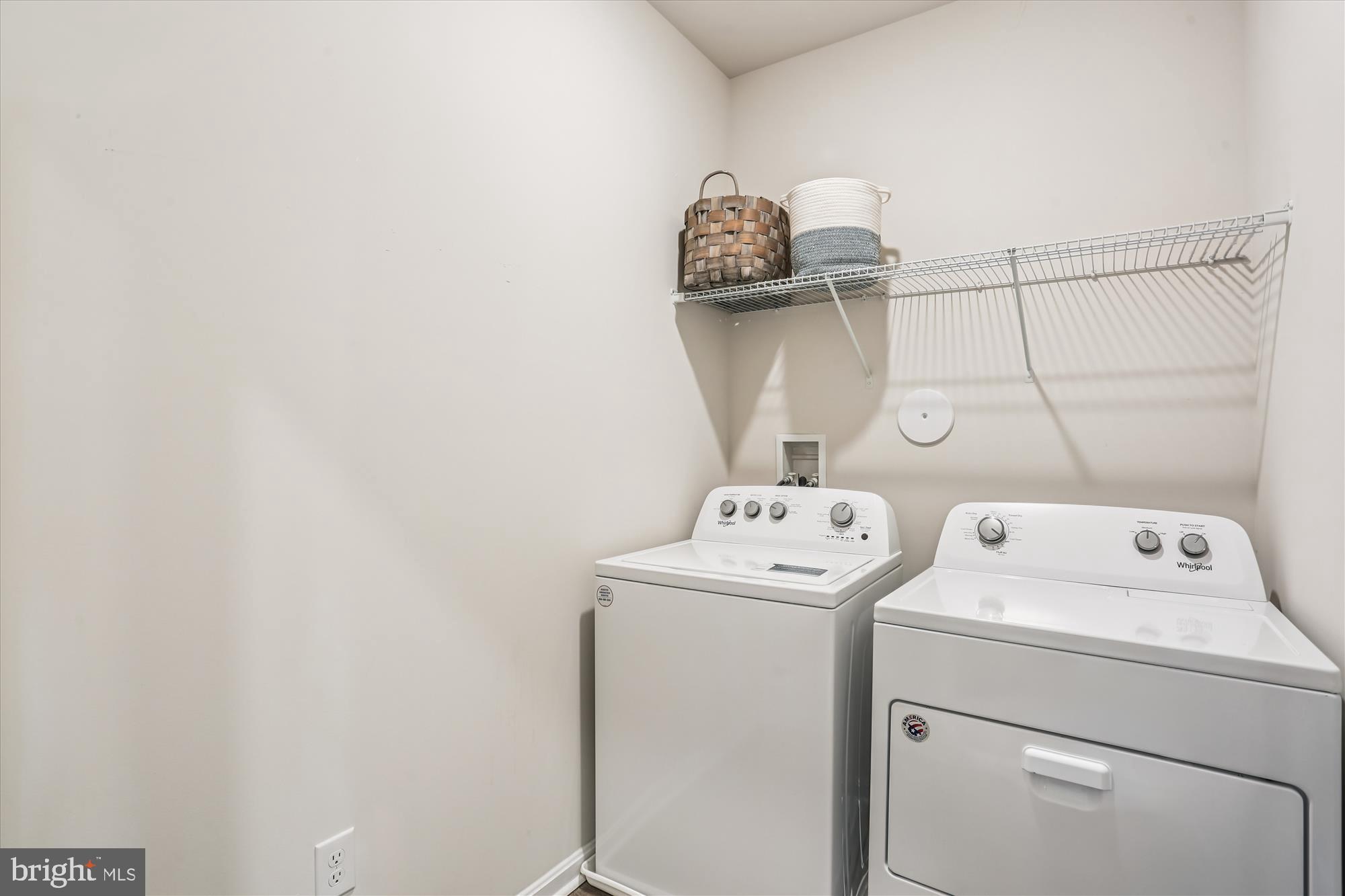 484 Tiller Street Frederick, MD 21701 - Photo 31 of 44 a utility room with dryer and washer