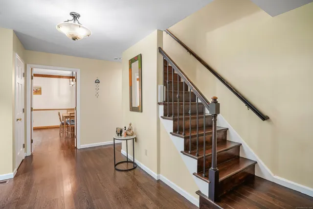 a view of entryway with wooden floor