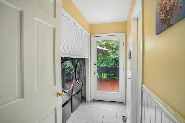 a very nice looking room with a large window with outer view