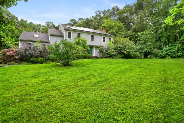 a house view with a garden space