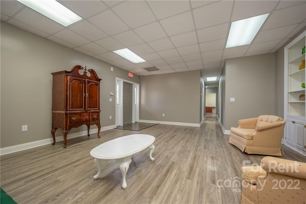 406 Daniel Road Spindale, NC 28160 - Photo 11 of 33 a living room with furniture a table and wooden floor