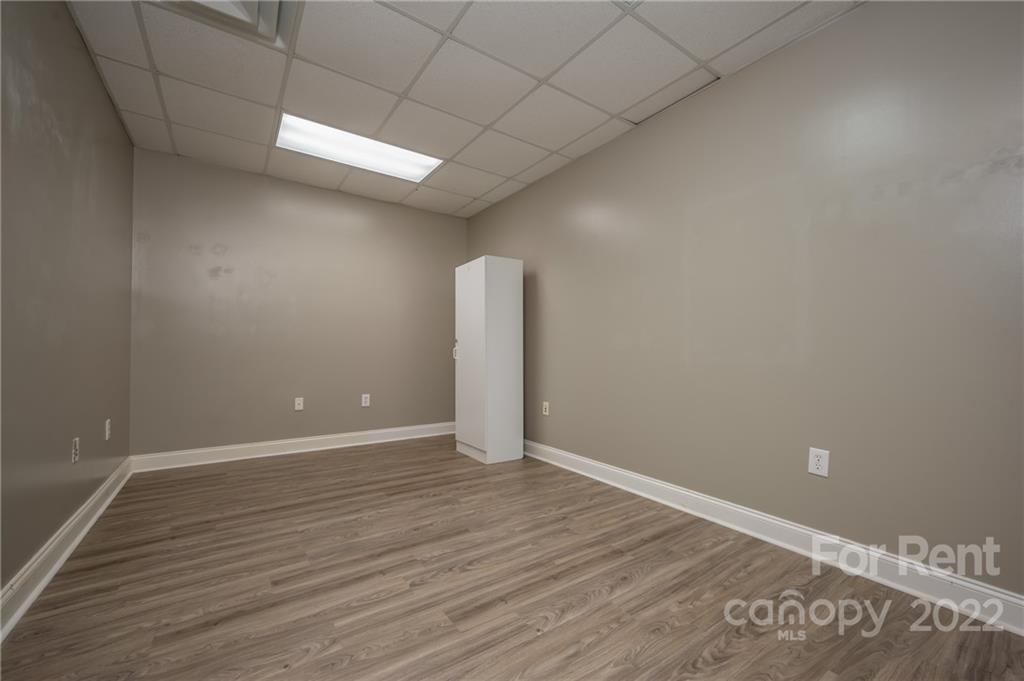 406 Daniel Road Spindale, NC 28160 - Photo 12 of 33 a view of an empty room with wooden floor