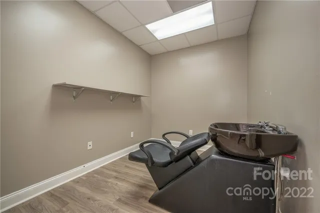 a picture of a bench in a room