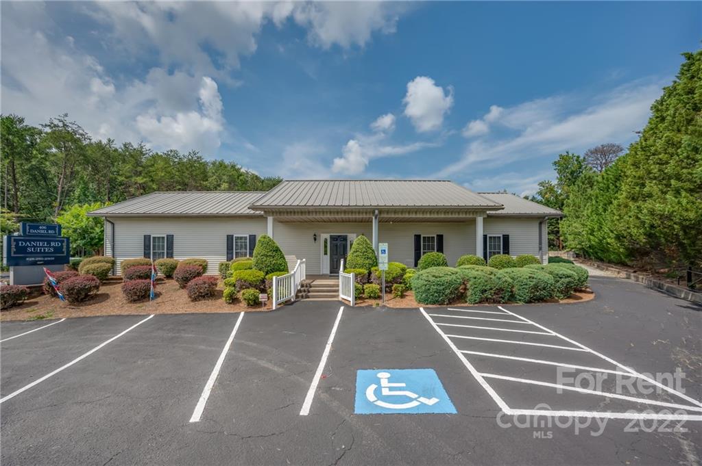 406 Daniel Road Spindale, NC 28160 - Photo 2 of 33 a front view of a house with a sitting space