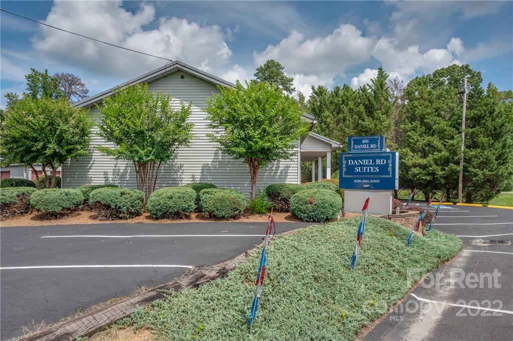 406 Daniel Road Spindale, NC 28160 - Photo 5 of 33 a house view with a garden space