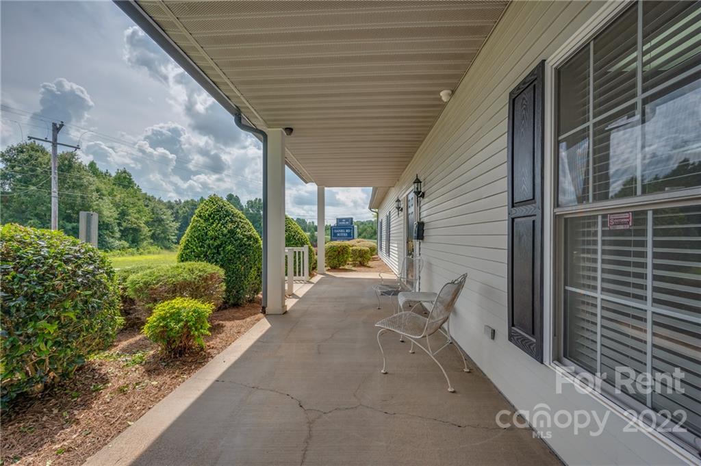 406 Daniel Road Spindale, NC 28160 - Photo 8 of 33 a view of backyard with plants and outdoor seating