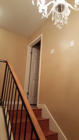 a view of entryway with wooden floor