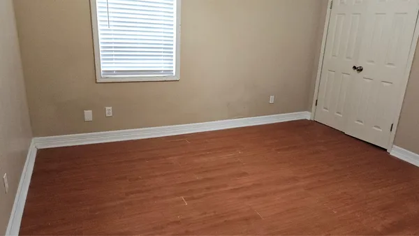 an empty room with a window