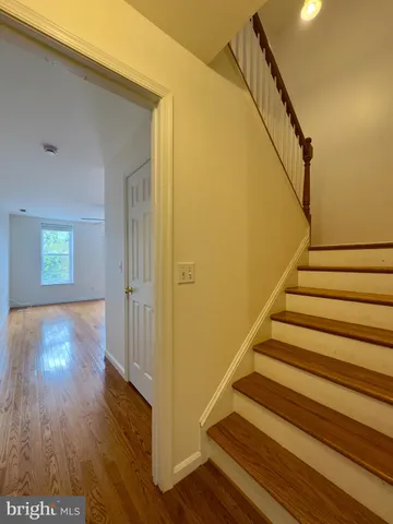 a view of entryway with wooden floor