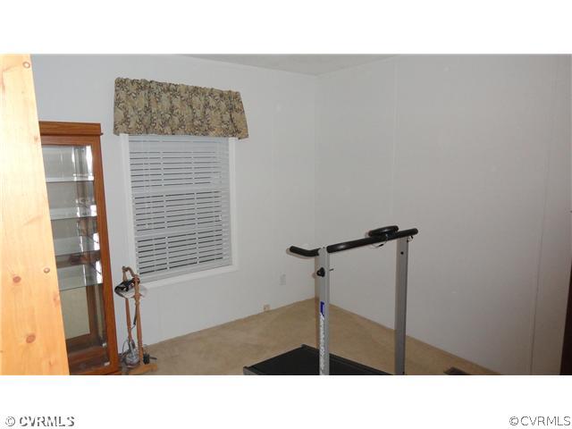 17206 Hamilton Arms Road Dewitt, VA 23840 - Photo 7 of 12 a black and white photo of a room