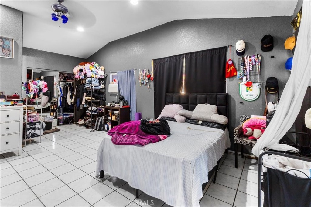 3715 South Neece Street Corona, CA 92879 - Photo 16 of 20 a bedroom with a bed and a closet