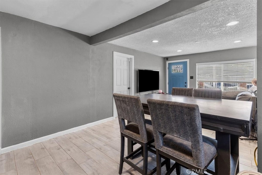 3715 South Neece Street Corona, CA 92879 - Photo 5 of 20 a view of a dining room with furniture