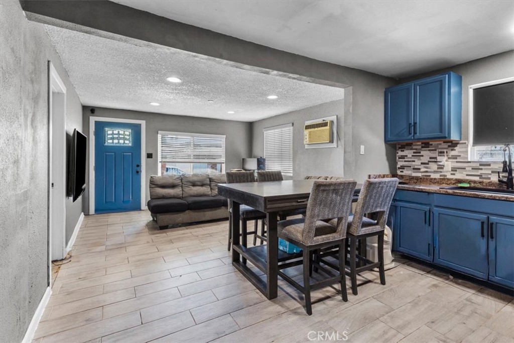 3715 South Neece Street Corona, CA 92879 - Photo 6 of 20 a view of a dining room with furniture