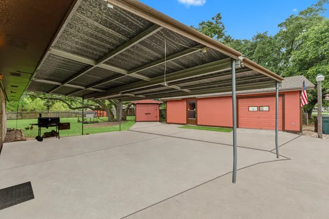 a view of a livingroom with furniture and a fireplace