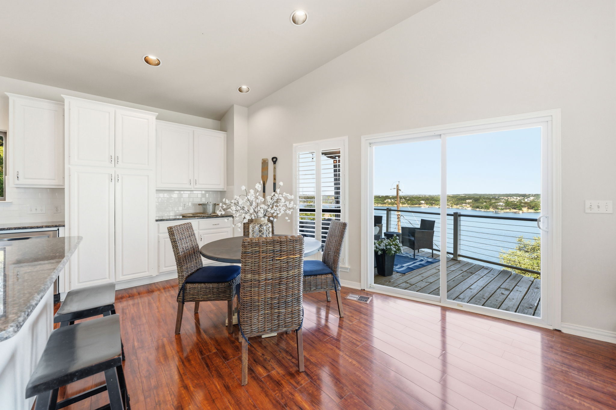 1715 Buffalo Gap Road Austin, TX 78734 - Photo 9 of 18 Gleaming hardwood floors and sliding glass doors open directly to a scenic lakeside deck.