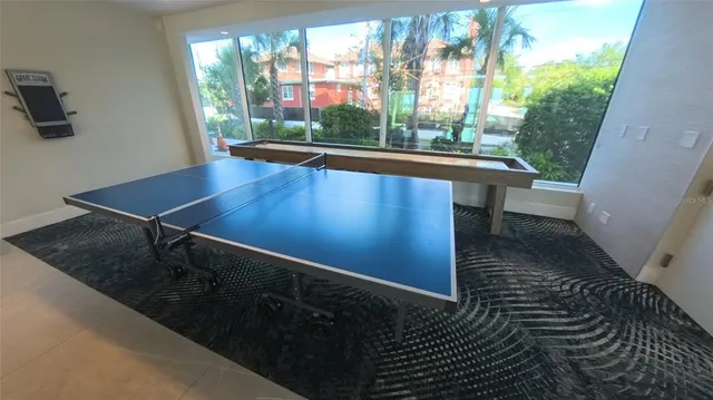 a view of a floor to ceiling window and wooden floor