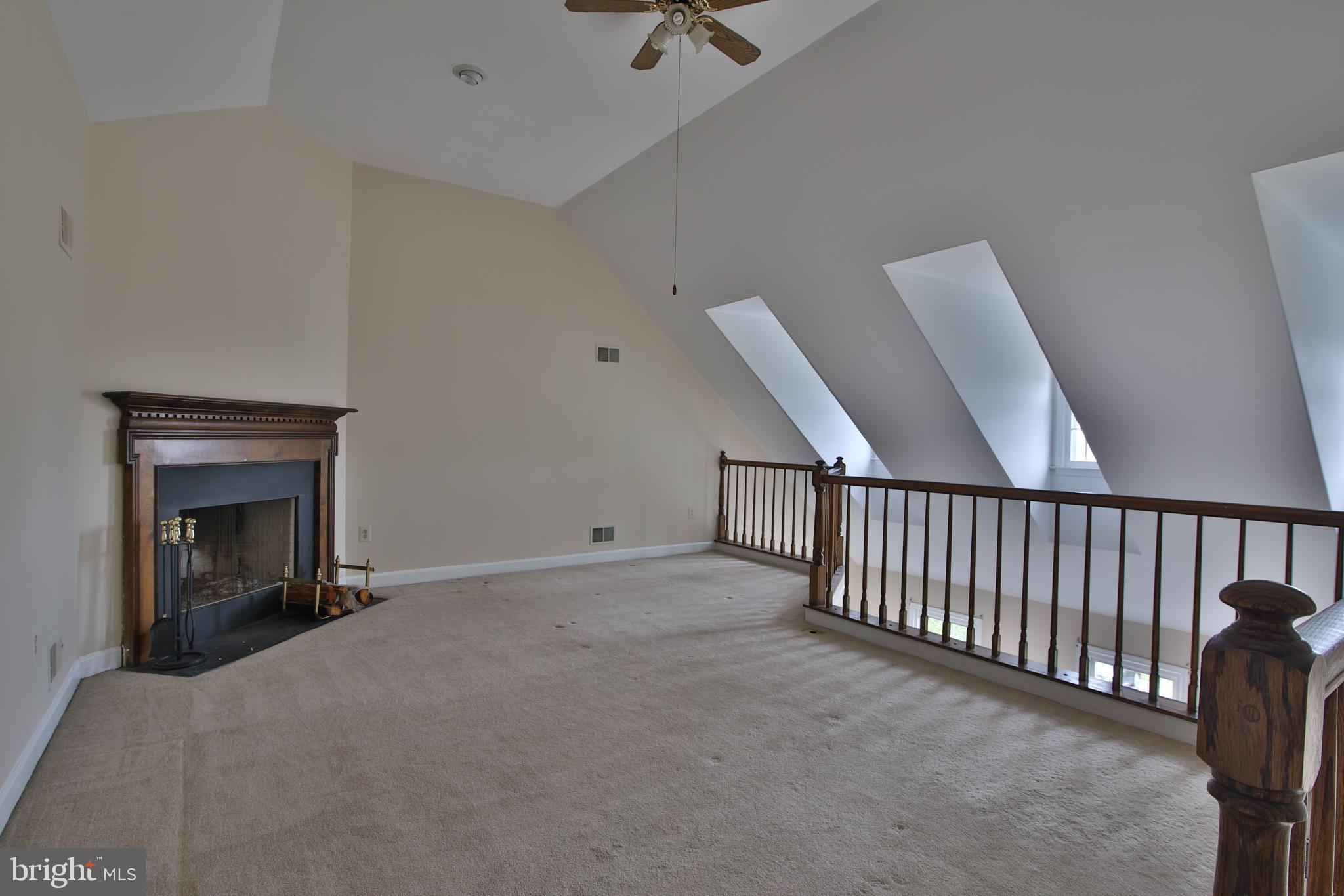 2142 Colonel Way Odenton, MD 21113 - Photo 17 of 25 Primary Bedroom Loft with Fireplace