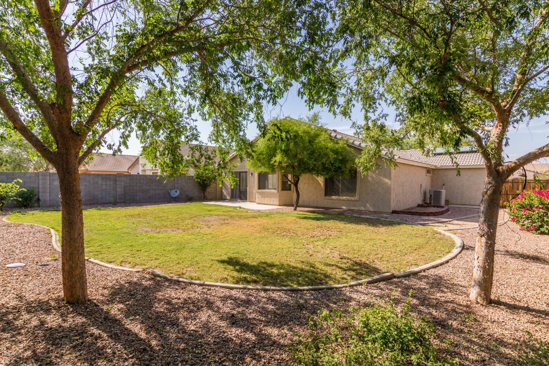2129 West Carson Road Phoenix, AZ 85041 - Photo 4 of 22 a view of a house with swimming pool