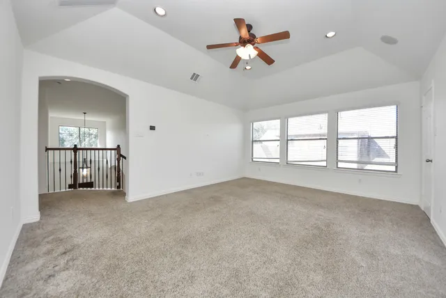 an empty room with windows