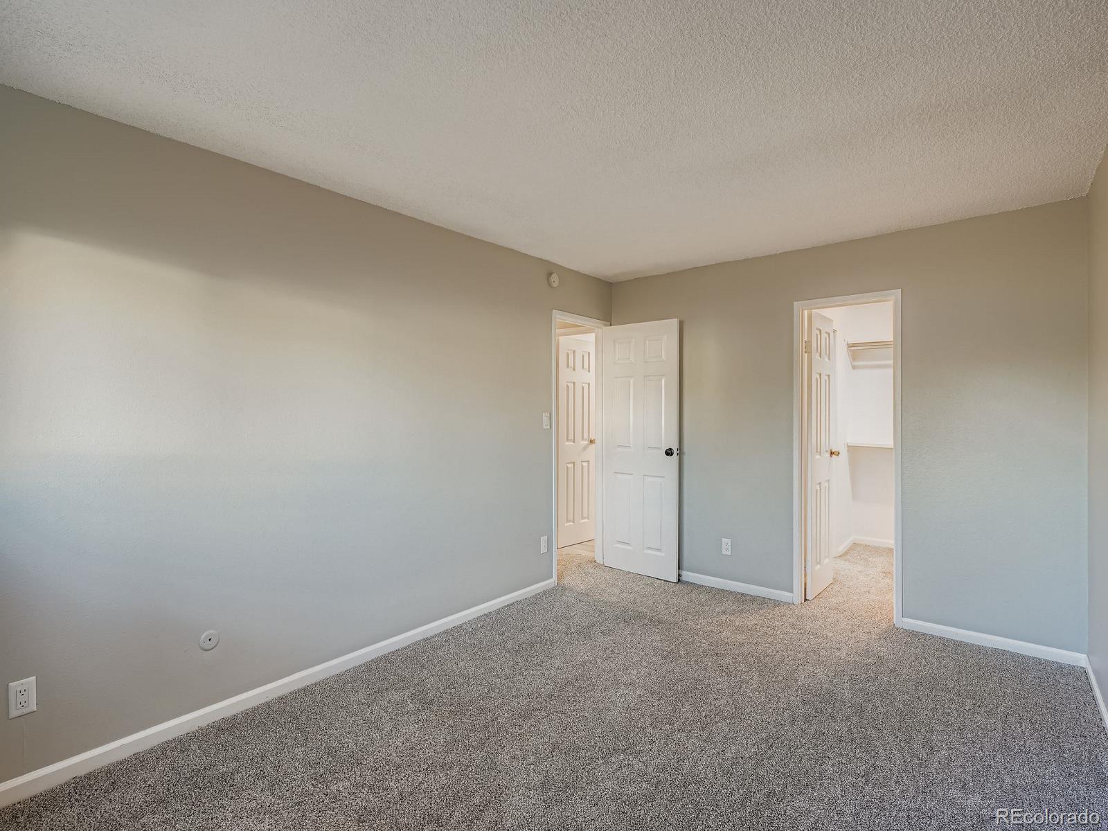 140 East Highline Circle, Unit 105 Centennial, CO 80122 - Photo 15 of 29 a view of an empty room