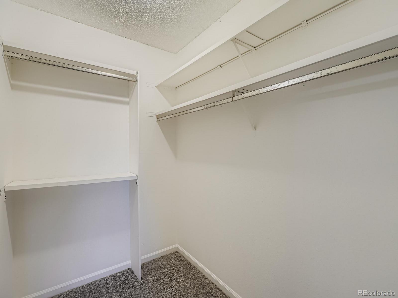 140 East Highline Circle, Unit 105 Centennial, CO 80122 - Photo 17 of 29 a view of an empty walk in closet