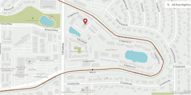 a house that has a tree in front of it