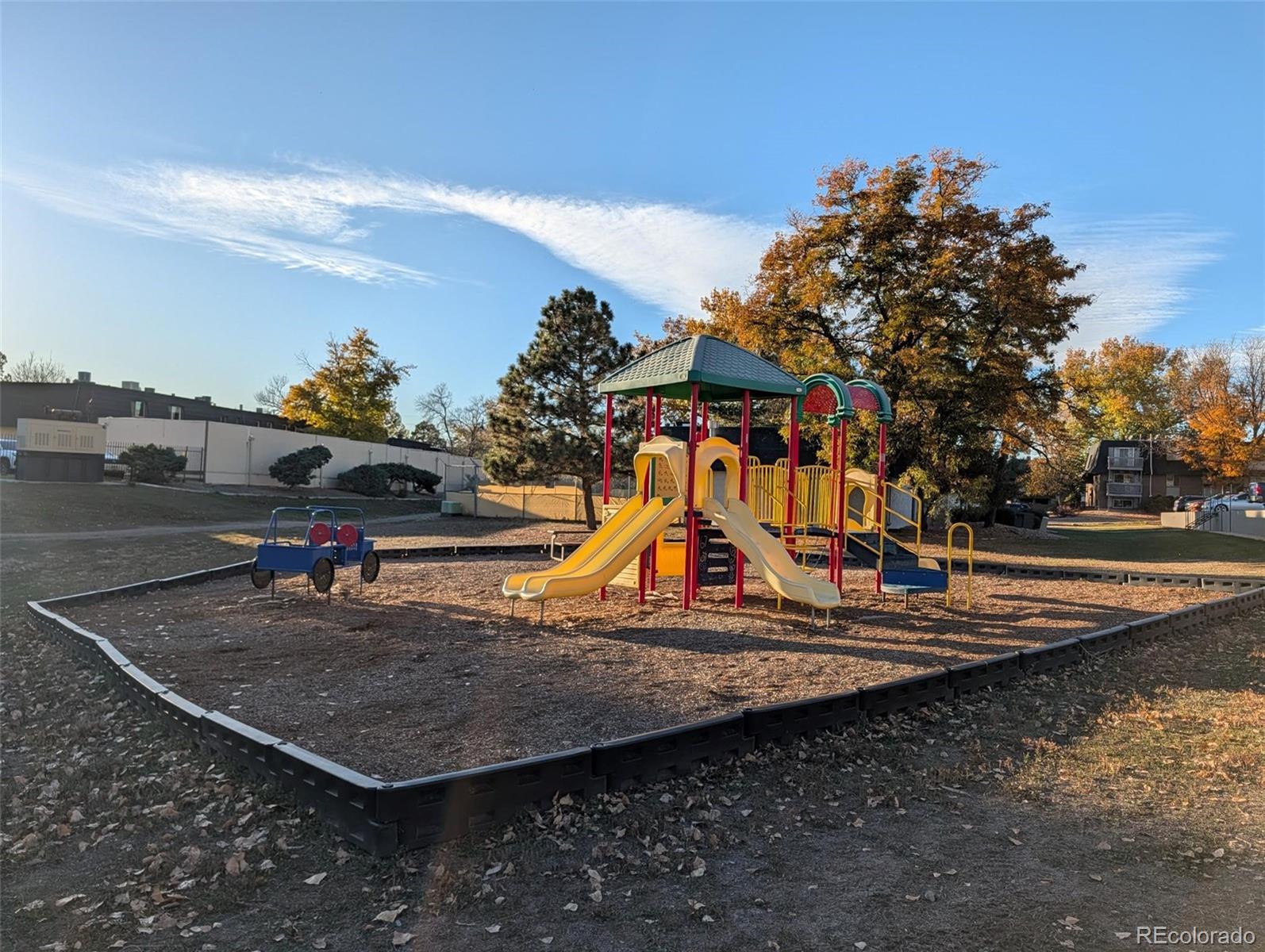 140 East Highline Circle, Unit 105 Centennial, CO 80122 - Photo 27 of 29 a view of outdoor space with seating area