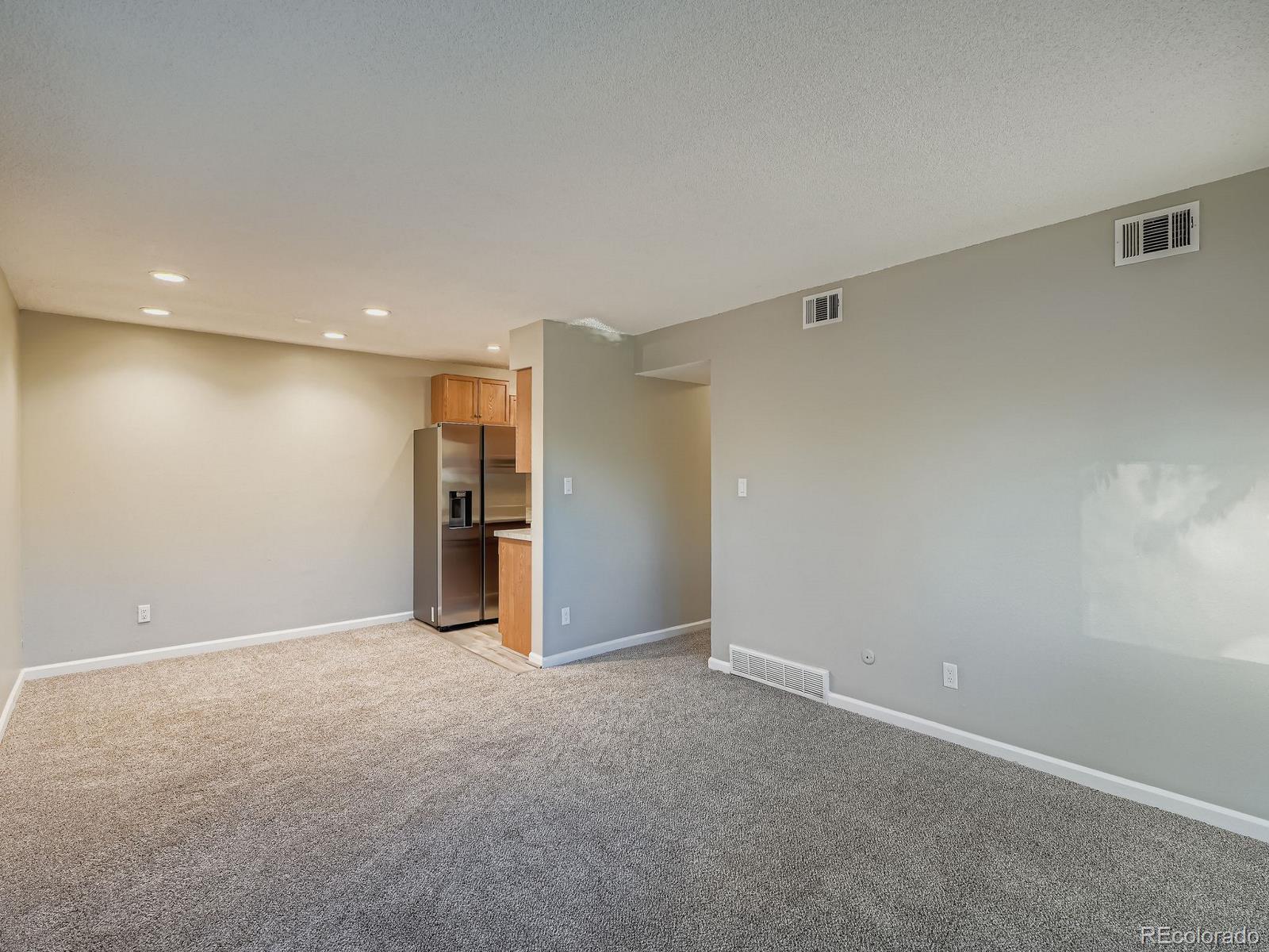 140 East Highline Circle, Unit 105 Centennial, CO 80122 - Photo 6 of 29 a view of an empty room