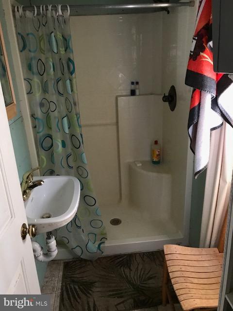 507 Easter Ridge Lane Winchester, VA 22603 - Photo 11 of 30 a bathroom with a sink and mirror with toilet