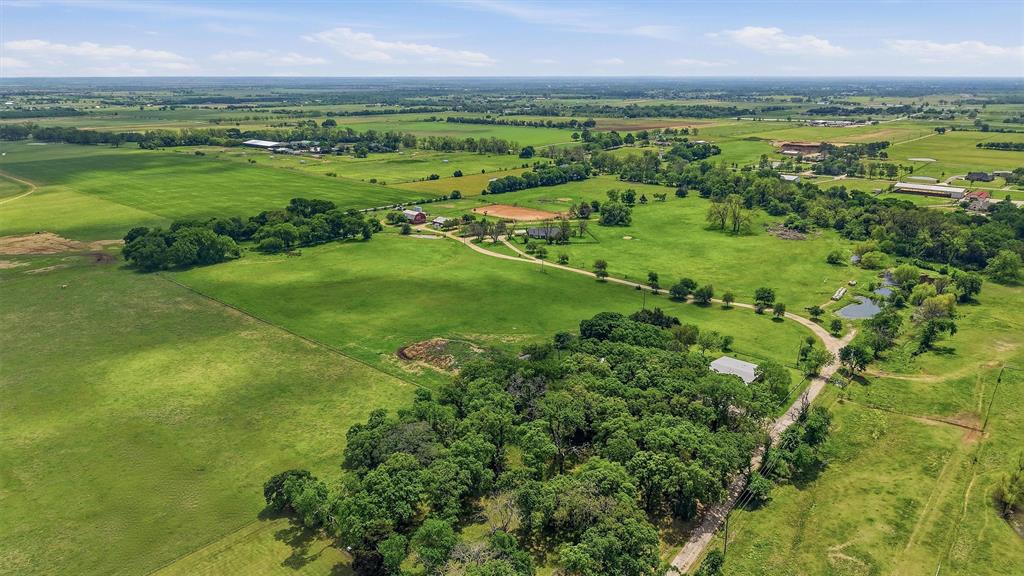 1100 Debbie Lane Pilot Point, TX 76258 - Photo 9 of 26 a view of a city with an ocean