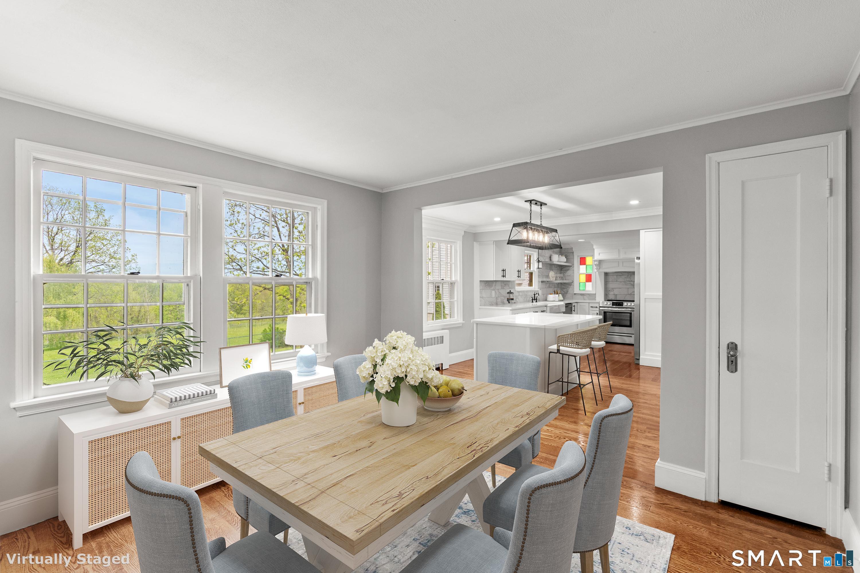 551 North Main Street Suffield, CT 06078 - Photo 7 of 38 Dining area with access to the side porch.