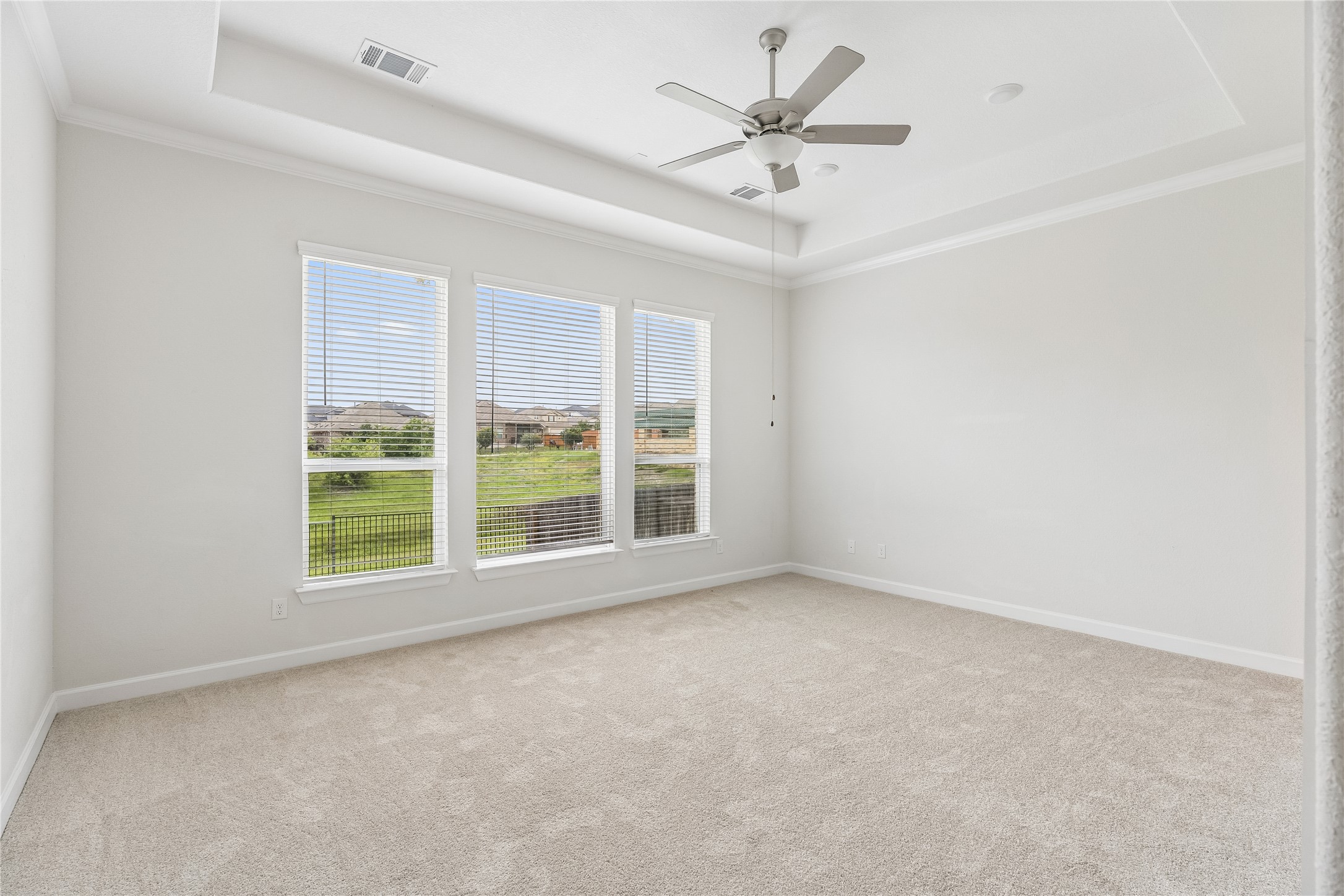 298 Wild Pecan Loop Buda, TX 78610 - Photo 17 of 40 an empty room with a window