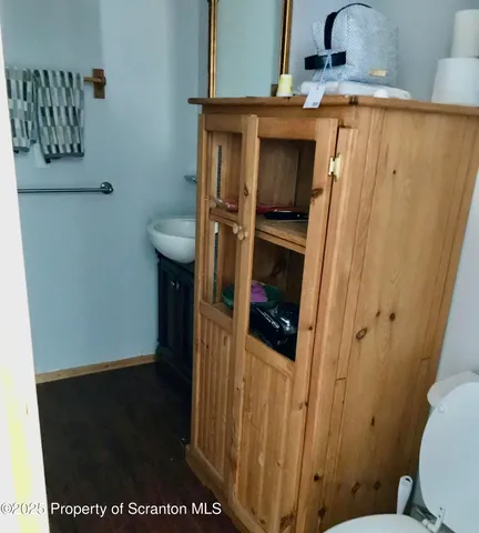 a bathroom with a sink and toilet
