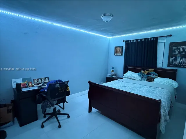 a room with furniture and air hockey table