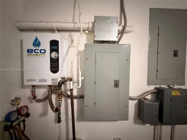 a view of a kitchen with appliances and cabinets