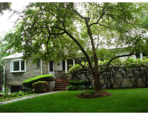 24 Helene Road Newton, MA 02468 - Photo 2 of 10 a view of a house with a backyard