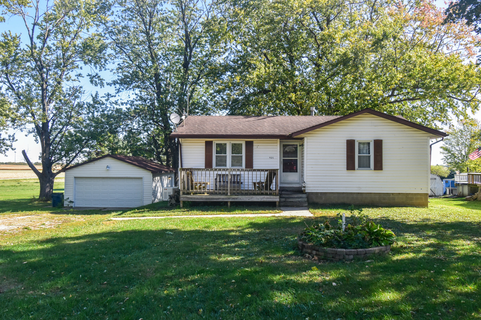 506 Boxelder Street Odell, IL 60460 - Photo 1 of 15 a house with swimming pool in front of it