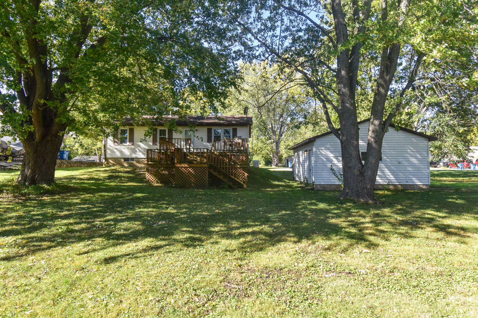 506 Boxelder Street Odell, IL 60460 - Photo 3 of 15 a backyard of a house with lots of green space
