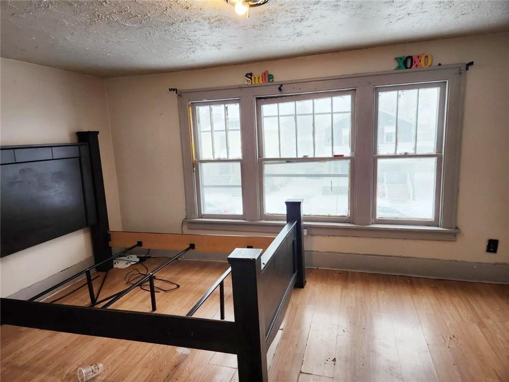 399 Baldwin Avenue Sharon, PA 16146 - Photo 11 of 23 a living room with furniture and a flat screen tv