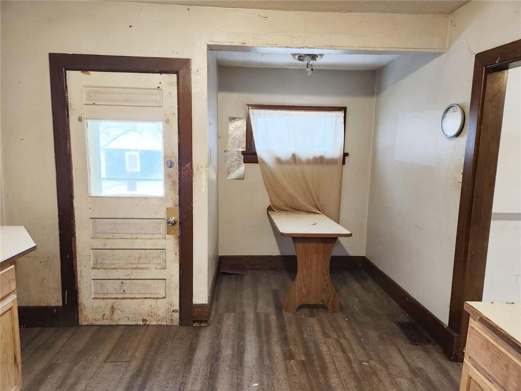 399 Baldwin Avenue Sharon, PA 16146 - Photo 7 of 23 a view of a hallway with wooden floor and staircase