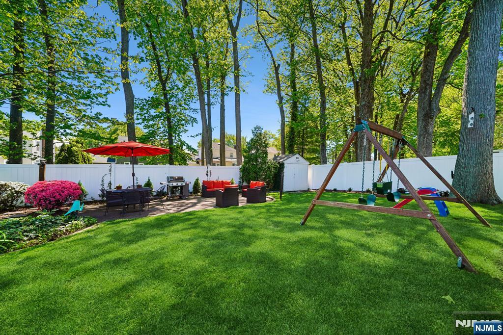 99 Ferncliff Road Bloomfield, NJ 07003 - Photo 27 of 30 a view of a backyard with a garden and entertaining space