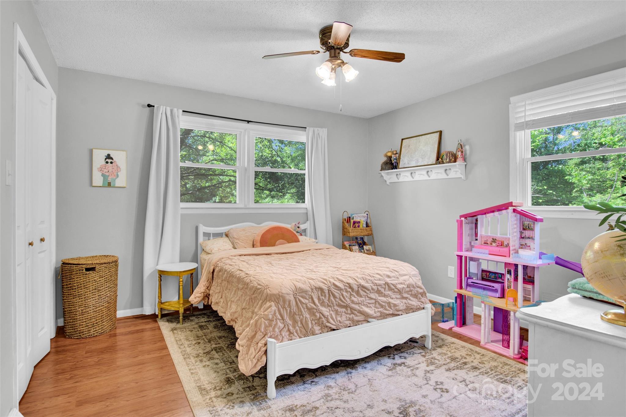 326 Gilbert Road Statesville, NC 28677 - Photo 15 of 25 a bedroom with a bed and a chandelier