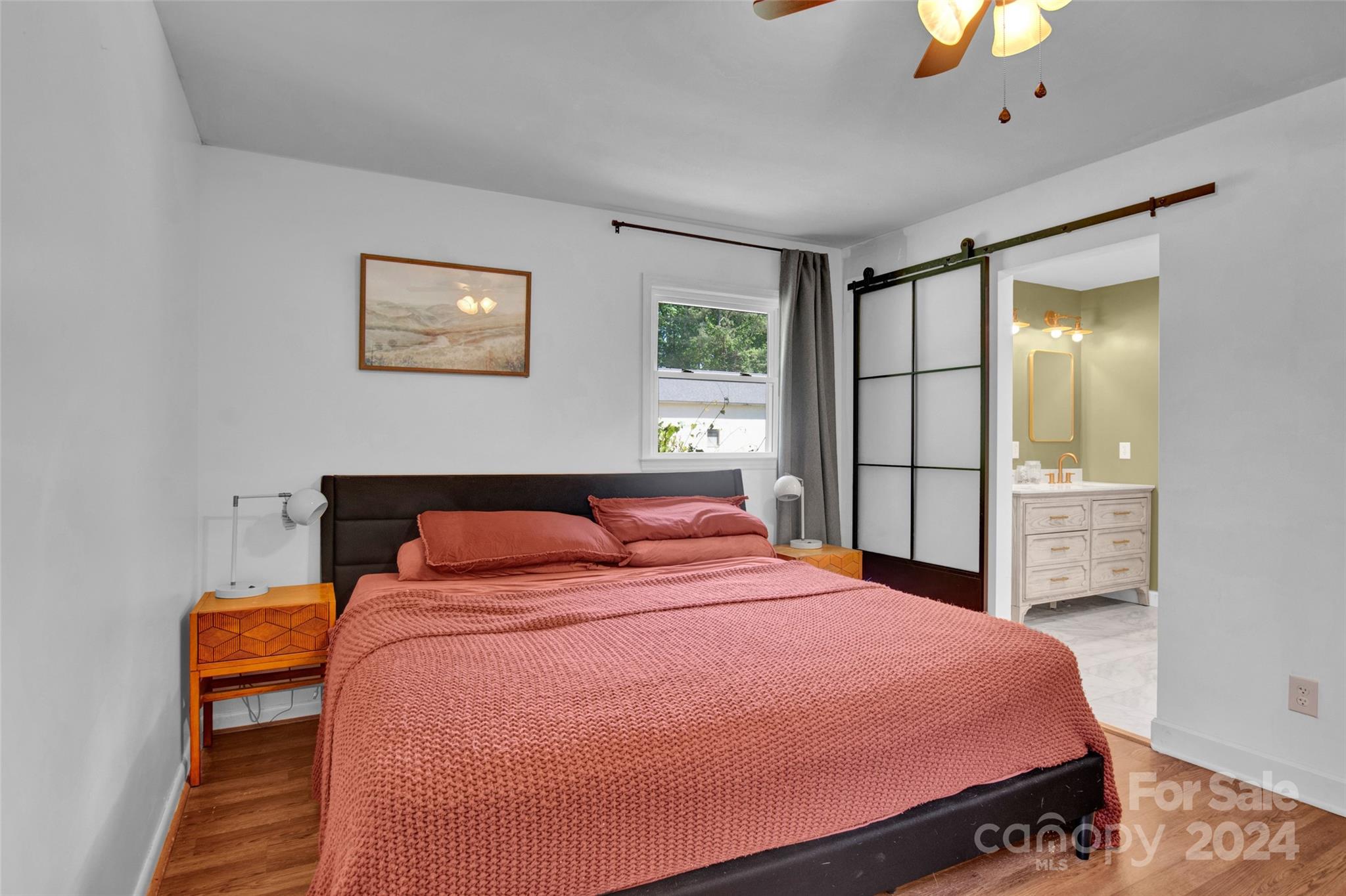 326 Gilbert Road Statesville, NC 28677 - Photo 16 of 25 a bedroom with a bed and wooden floor